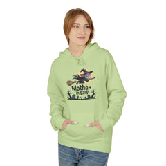 Person wearing a light green hoodie with a dragon design on a white background