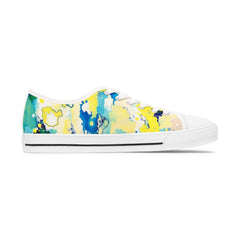 Colorful splatter-patterned sneaker on a white background
