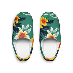 Tropical floral patterned slippers on a white background