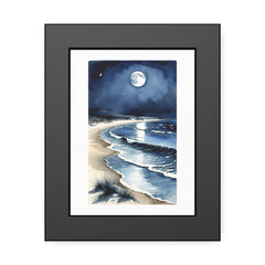 Framed artwork of a moonlit beach scene with a dark frame.