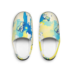 Pair of colorful slippers with abstract design on a white background