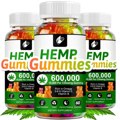 Three bottles of Hemp Gummy Gummies with colorful gummy bears on a white background.