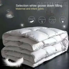 White goose down filling comforter with features on a dark background