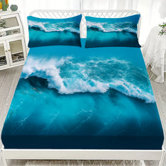 Bedding set with ocean wave design on a bed in a bedroom setting.