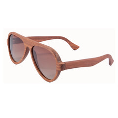 Wooden sunglasses with brown lenses on a white background