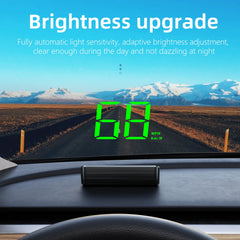 Car head-up display with digital speedometer on a road with mountains in the background